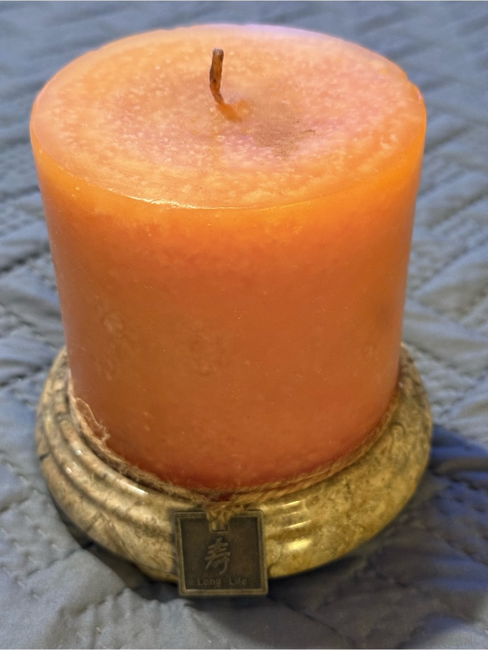 Orange Pillar Candle with Stone Base and Long Life Charm